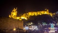 Aerial night view of Old Tbilisi, Georgia with Illuminated churches and Medieval fortress of narikala, 25.11.2016