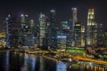 Aerial night view of Singapore cityscape with light projection at Fullerton Hotel.