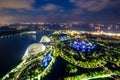 Aerial Night View Of Singapore Gardens Near Marina Bay In Singapore In Night.
