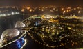 Aerial night view of The Supertree Grove at Gardens near Marina Bay with the sea in the background Royalty Free Stock Photo