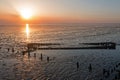 Aerial from an old ship wreck in the Wadden Sea in the Netherlands at sunset Royalty Free Stock Photo