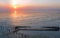 Aerial from an old ship wreck in the Wadden Sea in the Netherlands at sunset Royalty Free Stock Photo