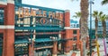 Aerial Oracle Park Willie Mays Gate ballpark entrance with palm trees and sign