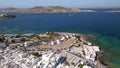 Aerial orbit view of famous windmills in Mykonos island, Greece on a sunny day