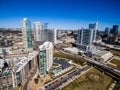 Aerial Over Austin Texas Modern Buildings and condominiums during sunny blue sky afternoon Royalty Free Stock Photo