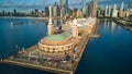 Aerial over end of Navy Pier during vintage car show with view of Chicago downtown skyline Royalty Free Stock Photo