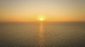 Aerial over water with inspiring sun rising over great Lake Michigan, sunrise at dawn, Chicago, IL Royalty Free Stock Photo