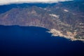 Aerial overcloud view on Tenerife island from airplane, Los Gigantes