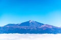 Aerial overcloud view on Tenerife island from airplane