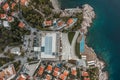 Aerial overhead drone shot of Dubrovink Lapad coastline by adriatic sea in Croatia summer morning before sunrise