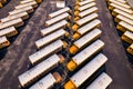 Aerial overhead photo of a parking lot full with school busses