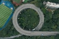 Aerial overhead shot of particular double circle 720 degree flyover in bushes residential buildings in Chongqing, China Royalty Free Stock Photo