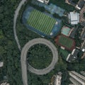 Aerial overhead shot of particular double circle 720 degree flyover in bushes residential buildings in Chongqing, China Royalty Free Stock Photo