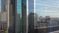 Aerial pan between downtown Los Angeles LA street, California Plasa, Financial District