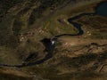 Aerial panorama of andes mountain tent Camp Jahuacocha lake river Cordillera Huayhuash Circuit Ancash Peru South America