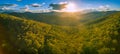 Aerial panorama of Australian forest and mountains at sunset. Royalty Free Stock Photo