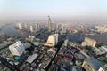 Aerial panorama of Bangkok in the morning with Taksin Bridge over Chao Phraya River and skyscrapers along the riverside Royalty Free Stock Photo