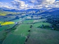 Aerial panorama of beautiful Australian agricultural countryside at sunset. Kiewa Valley, Victoria, Australia.