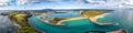 Aerial panorama of beautiful ocean coastline and inlet in Australia. Royalty Free Stock Photo