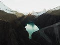 Aerial panorama of blue turquoise alpine mountain lake Laguna Paron in Caraz Huaraz Ancash Cordillera Blanca Peru Royalty Free Stock Photo