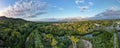 Aerial panorama of Cairns Botanical garden at sunset showing the rainforrest and Cairns city