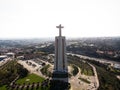 Aerial panorama of Christ the King Sanctuary Cristo Rei statue catholic christian monument in Alameda Lisbon Portugal