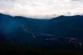 Aerial panorama of the city of Cali taken from the top of Cristo del Rey against a blue sky. Colombia