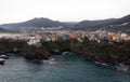 Aerial panorama of cliff houses buildings in spanish seaside atlantic ocean town village city Carino Galicia Spain