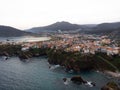 Aerial panorama of cliff houses buildings in spanish seaside atlantic ocean town village city Carino Galicia Spain