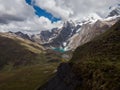 Aerial panorama of Cordillera Huayhuash Circuit andes mountain lake Laguna Carhuacocha Gangrajanca Ancash Peru