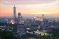 Aerial panorama of downtown Taipei City with Taipei 101 Tower among skyscrapers under dramatic sky Royalty Free Stock Photo