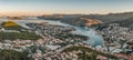 Aerial panorama drone shot of Lapad in Dubrovnik with sunrise over hill peak in cruise port in Croatia summer morning