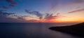 Aerial panorama drone shot of sunset burning sky clouds on Komiza town over Vis Island in Croatia Summer Royalty Free Stock Photo