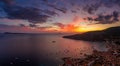 Aerial panorama drone shot of sunset burning sky clouds on Komiza town over Vis Island in Croatia Summer Royalty Free Stock Photo