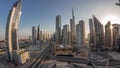 Aerial panorama of Dubai Downtown skyline with many towers night to day timelapse. Royalty Free Stock Photo