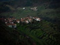 Aerial panorama of green agriculture farming terraces old remote rural mountain village town Padrao Portugal