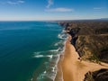 Aerial panorama of idyllic landscape rocky cliff shore Praia da Cordoama beach atlantic ocean Sagres Algarve Portugal Royalty Free Stock Photo