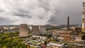 Aerial panorama of industrial area with smoke from chimneys of thermal power plant or station Royalty Free Stock Photo