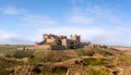 Aerial panorama landscape of Bamburgh Castle and sand dunes in Northumberland Royalty Free Stock Photo