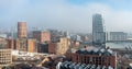 Aerial panorama of Leeds cityscape skyline in fog and mist Royalty Free Stock Photo