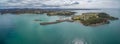 Aerial panorama of the lookout point where people watch for whales and wharf in Eden, NSW, Australia.