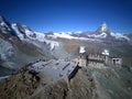 Aerial panorama of majestic mountain Matterhorn in morning sunlight with the famous Gornergrat Observatory