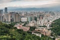 Aerial panorama over Downtown Taipei with layers of mountain in background in the dusk from Xiangshan Elephant Mountain. Royalty Free Stock Photo