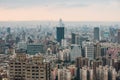 Aerial panorama over Downtown Taipei with layers of mountain in background in the dusk from Xiangshan Elephant Mountain. Royalty Free Stock Photo