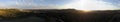 Aerial panorama over hills and polo fields at sunset Royalty Free Stock Photo