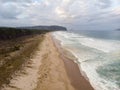 Aerial panorama of sand coast pacific ocean sea shore Opoutere beach waves Waikato Coromandel Peninsula New Zealand Royalty Free Stock Photo