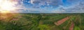 Aerial panorama view of countryside with windmills, Agriculture fields and different variety of harvest, Panaramic view of forest