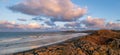 Aerial panorama view of Embleton Bay and Dunstanburgh Castle Royalty Free Stock Photo
