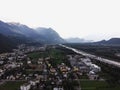 Aerial panorama view of industrial area along Rhine river valley outskirts of Vaduz Liechtenstein Alps mountains Europe Royalty Free Stock Photo