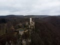 Aerial panorama view of medieval Schloss Lichtenstein castle on hill cliff edge in Echaz valley Honau Reutlingen Germany Royalty Free Stock Photo